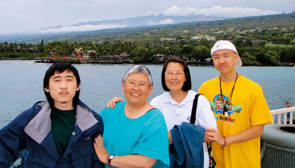 Photo of Mushim Ikeda and Jiko with her sons.