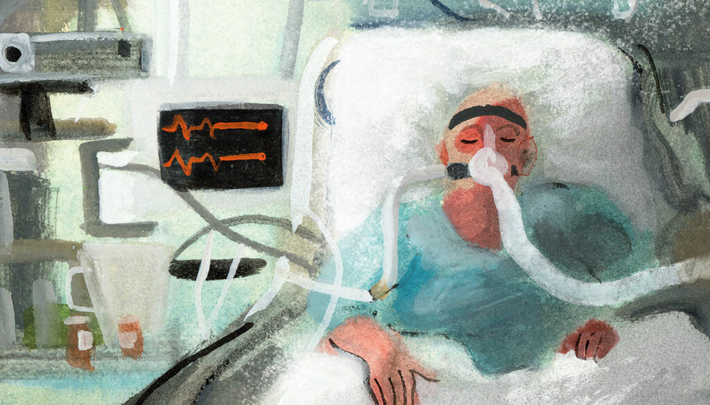 Person sits in hospital bed with ventilator.
