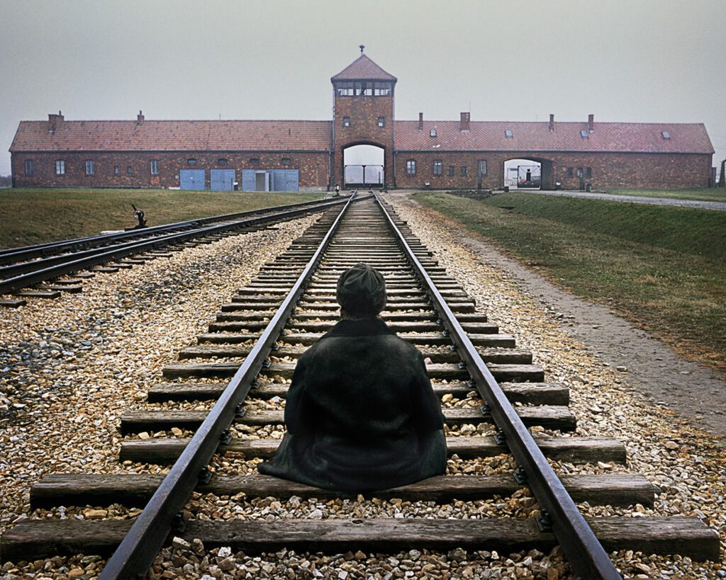 A meditator sits in practice at Auschwitz-Birkenau Nazi death camp in Poland