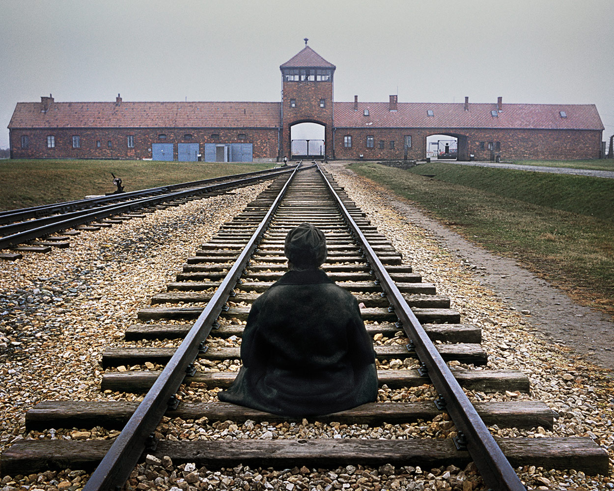 A meditator sits in practice at Auschwitz-Birkenau Nazi death camp in Poland