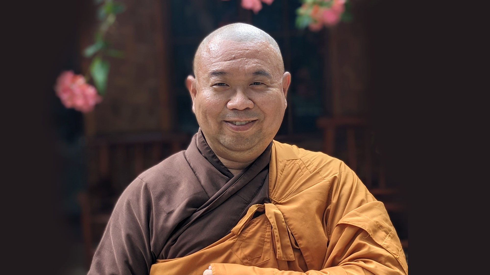 Photo of Brother Troi Bao Tạng, a monastic in the Plum Village tradition, who discusses why a non-binary monastic order is needed, and the practice of speaking up and letting go.