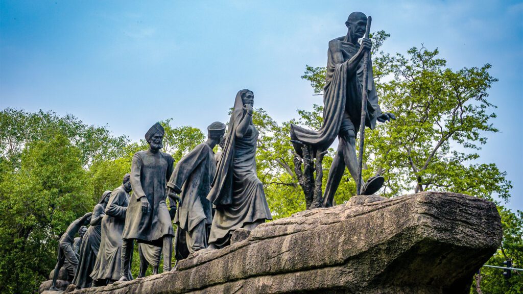 Photo of a statue of Gyara Murti Gandhi, walking