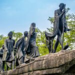 Photo of a statue of Gyara Murti Gandhi, walking