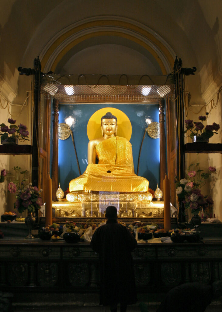 This image has an empty alt attribute; its file name is Buddha-Mahobodhi-Temple-69432-1-730x1024.jpg