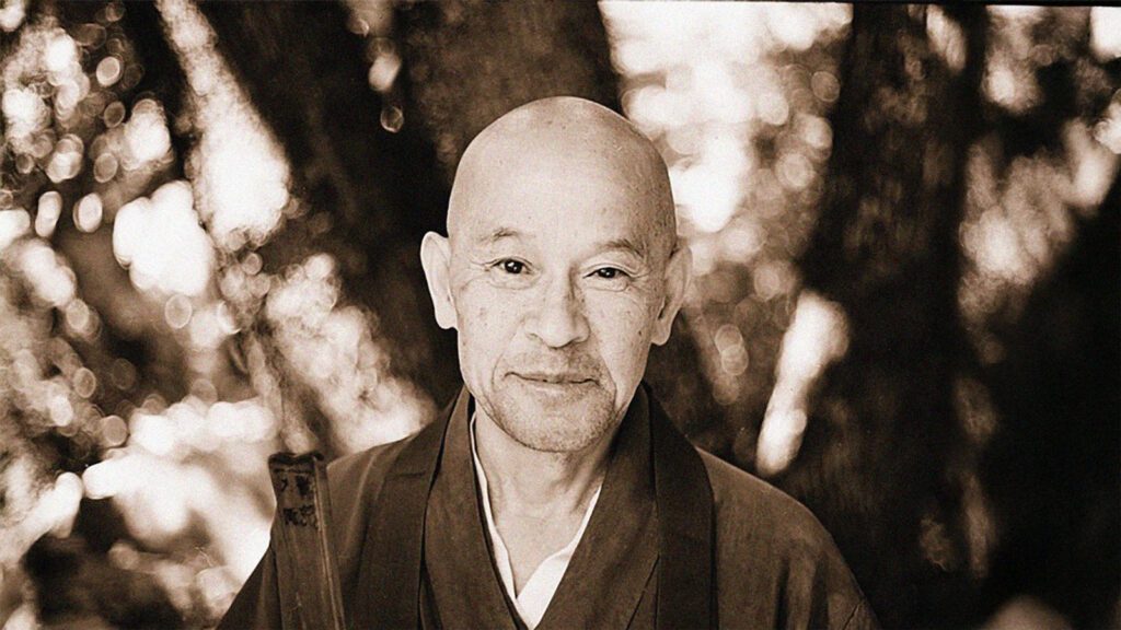 Sepia tone photo of Shunryu Suzuki Roshi